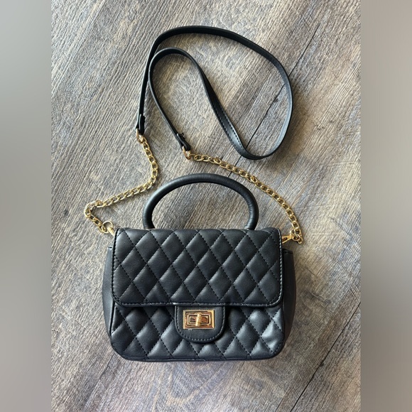 Small Black Top Handle Bag with Unique Silver Tone Hand Clasp main image 1